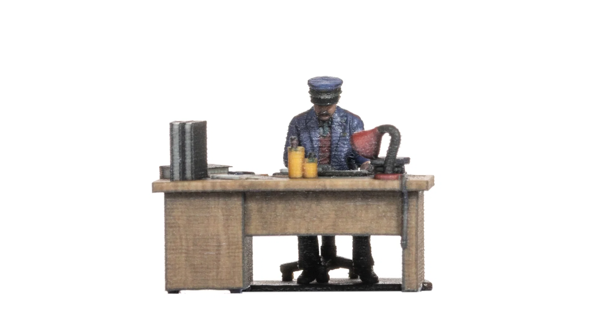 Agent des chemins de fer à son bureau